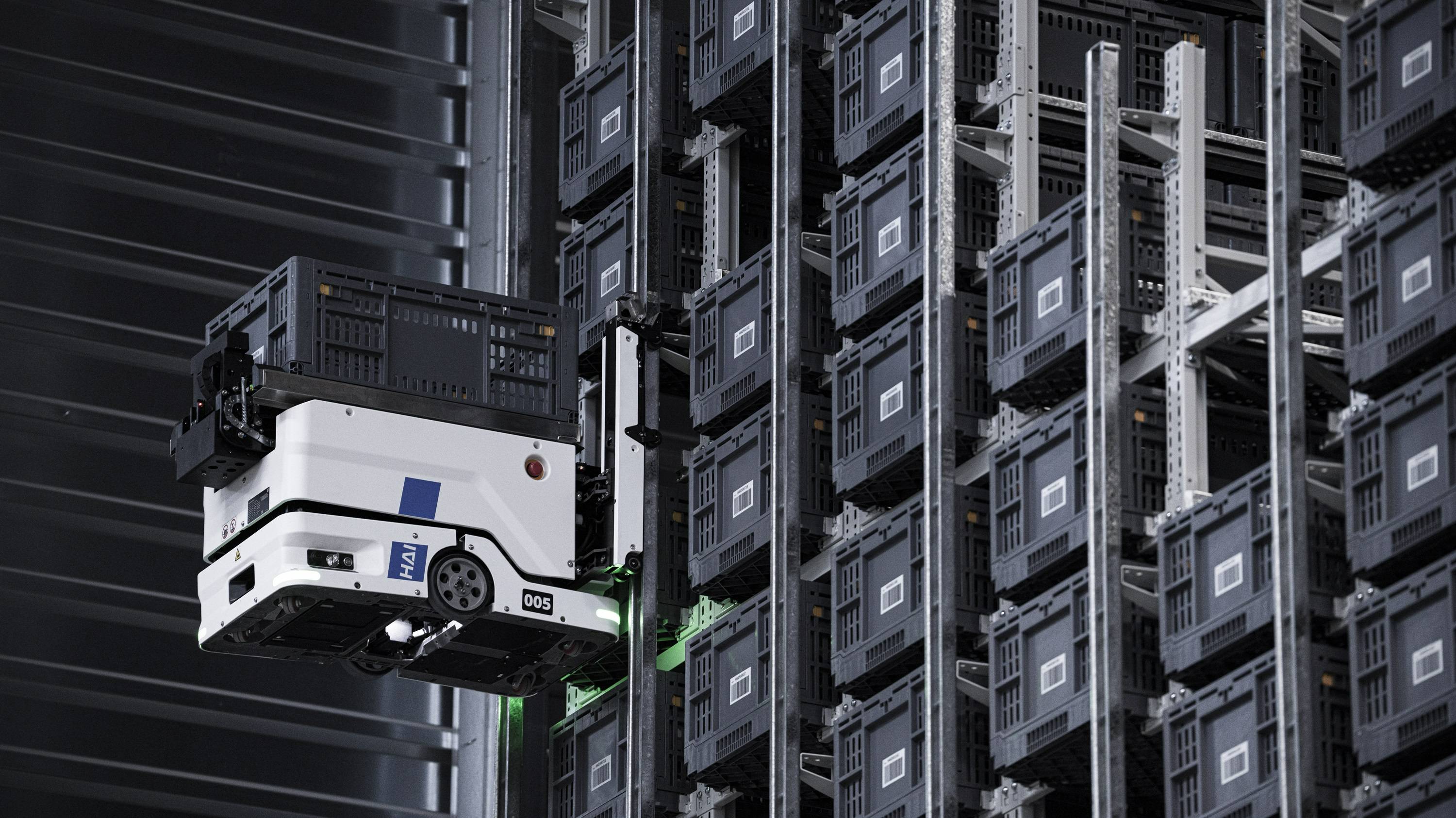 HaiPick Climb climbing robot retrieving inventory from high-density warehouse storage racks